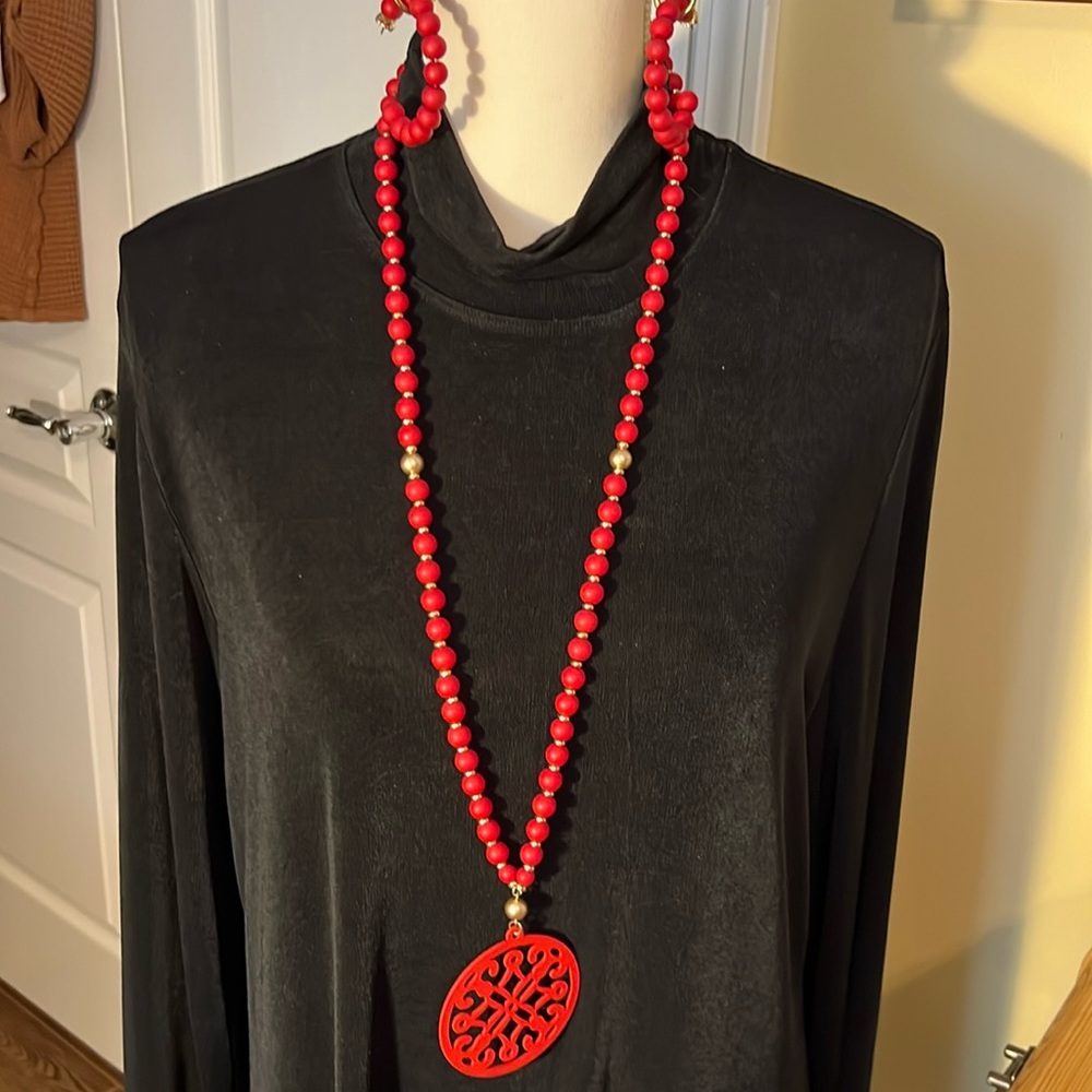 Chicos, necklace, earrings, and three bracelets and red and gold